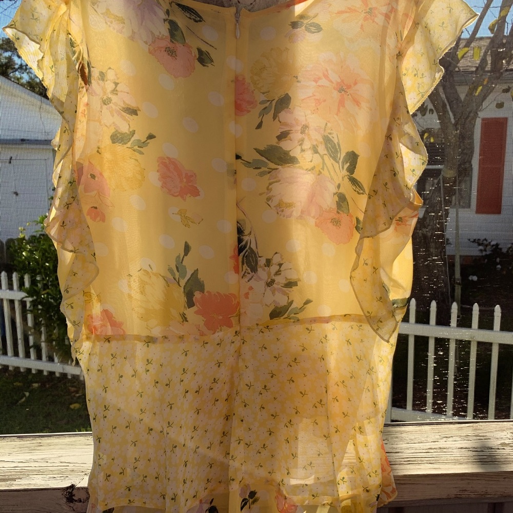 Dainty and frilly pale yellow blouse